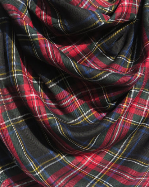 Close-up of plaid fabric with red, blue, and black colors in Black Stewart tartan