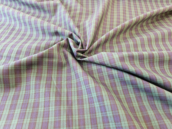 navy and green plaid fabric scrunched in Black Watch tartan