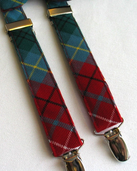 british columbia tartan red green blue yellow white Plaid suspenders with metallic clips on a white background