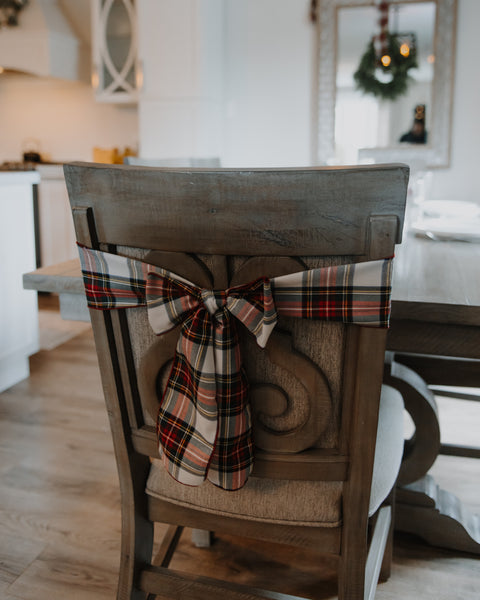 dress stewart tartan christmas chair sash on a wooden chair