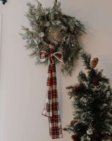 flocked wreath with a dress stewart tartan white red yellow plaid bow ribbon