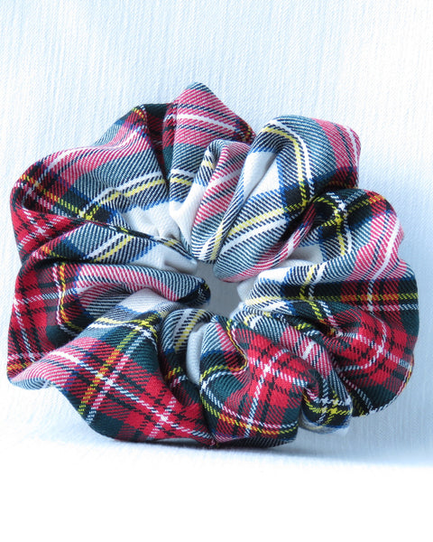 Red green white yellow Plaid patterned scrunchie on a white background