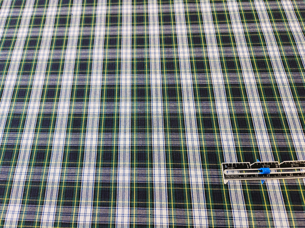 white and navy plaid cotton fabric with a ruller to measure size sold by TaylorsTartans.com