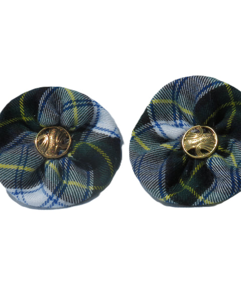 Pair of dress gordon tartan shoe clips with gold centers on a white background
