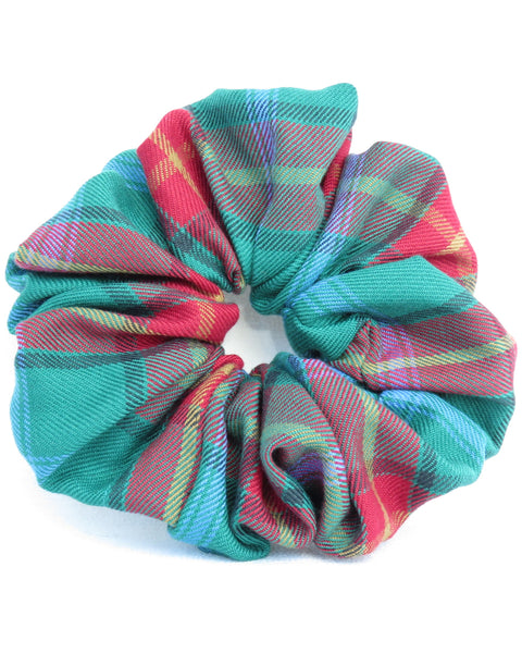 dark red green blue and gold Plaid patterned scrunchie on a white background