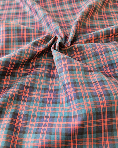 Close-up of plaid fabric with red and blue pattern