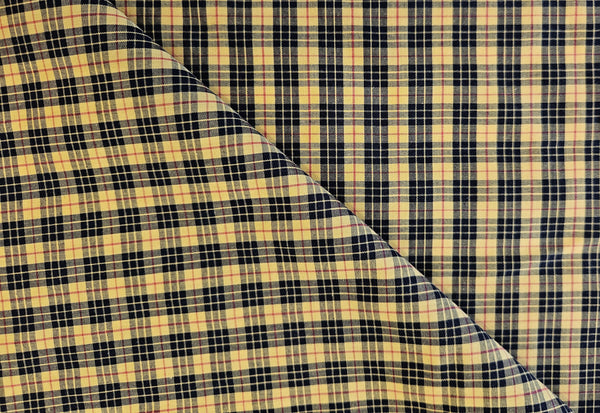 yellow and black plaid cottton fabric folded over itself sold by TaylorsTartans.com