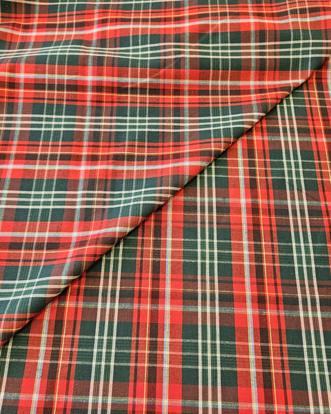 Plaid fabric with red, green, and white pattern of the New Brunswick tartan