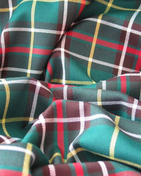 green, brown, yellow and white plaid fabric in Newfoundland tartan material