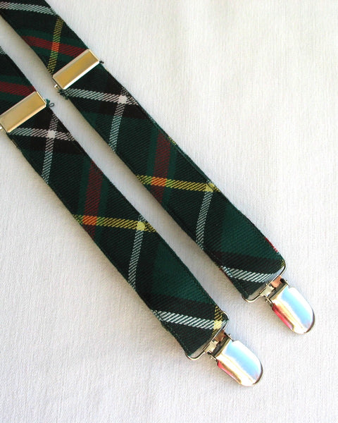 newfoundland tartan Green plaid suspenders with gold clips on a white background