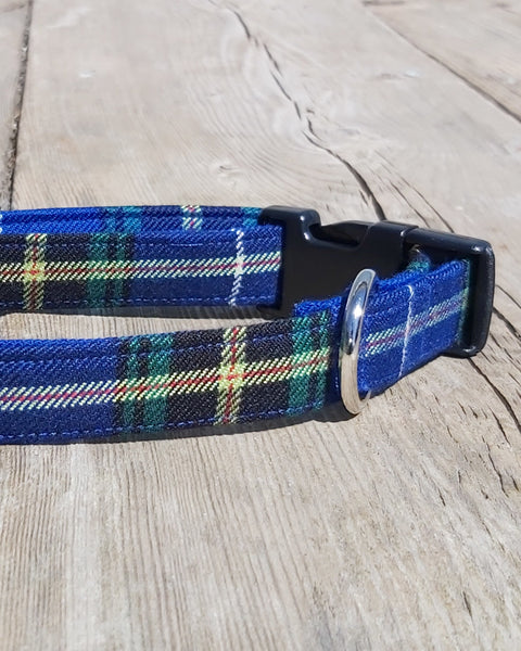 Royal blue plaid dog collar in Nova Scotia tartan made by Taylors Tartans lanying on weathered boards