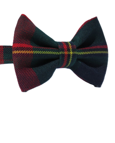 Plaid bow tie with red, green, and yellow pattern on a white background