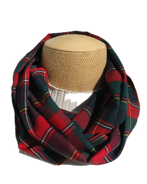 red, blue, green, white Plaid infinity scarf on a mannequin head with a white background