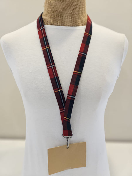 Quebec Plaid lanyard with a name tag holder on a mannequin bust.