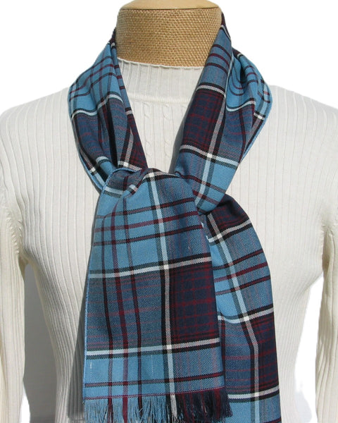 RCAF Plaid scarf draped over a mannequin with a white sweater