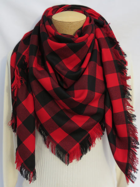 Red and black checkered scarf on a mannequin with a white background made by Taylors Tartans