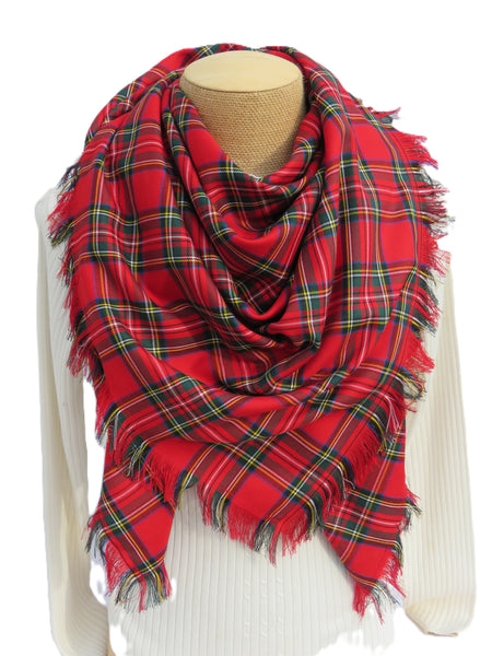Red plaid scarf on a mannequin with a white background