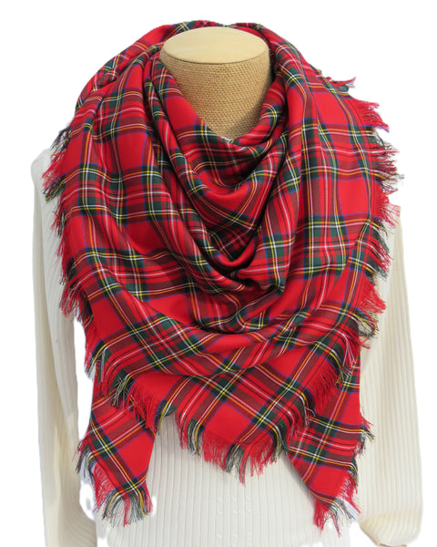 Red plaid scarf on a mannequin with a white background