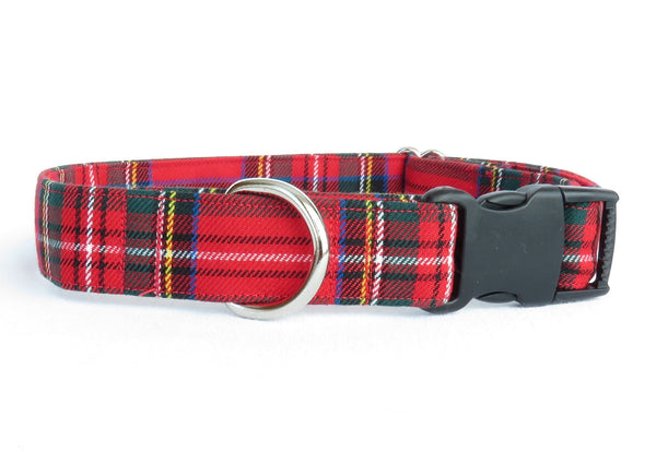 A red and green plaid pet collar with a metal D ring and black buckle, suitable for Christmas photos.