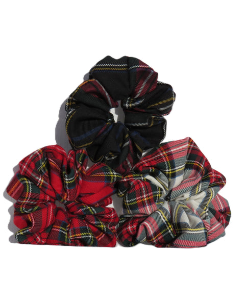 Set of plaid scrunchies on a white background