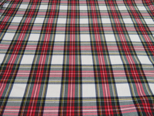 white and red plaid fabric laid flat to show the repeat of the pattern
