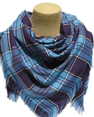 Blue and purple plaid scarf on a mannequin head against a white background