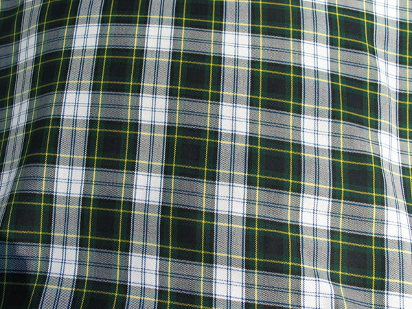 White, navy, and green plaid fabric with fine yellow lines, sold by Taylors Tartans. Perfect for apparel and crafts.