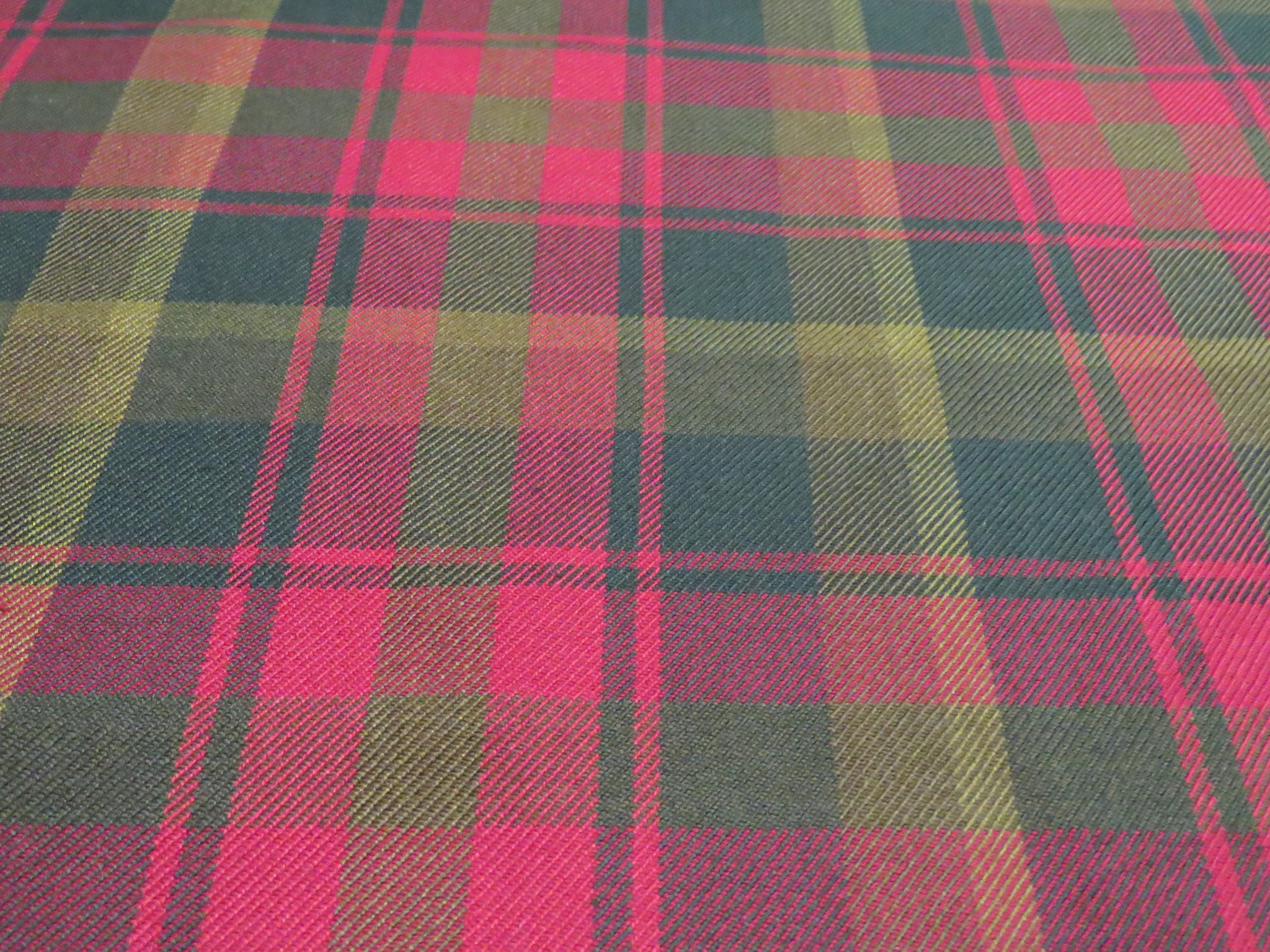 close up of red, brown and tan plaid fabric material