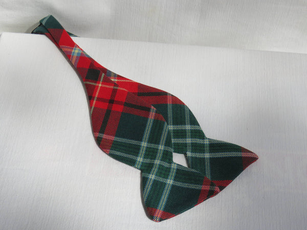 New Brunswick tartan freestyle bow tie in classic red and green plaid, handcrafted for a timeless, adjustable fit.