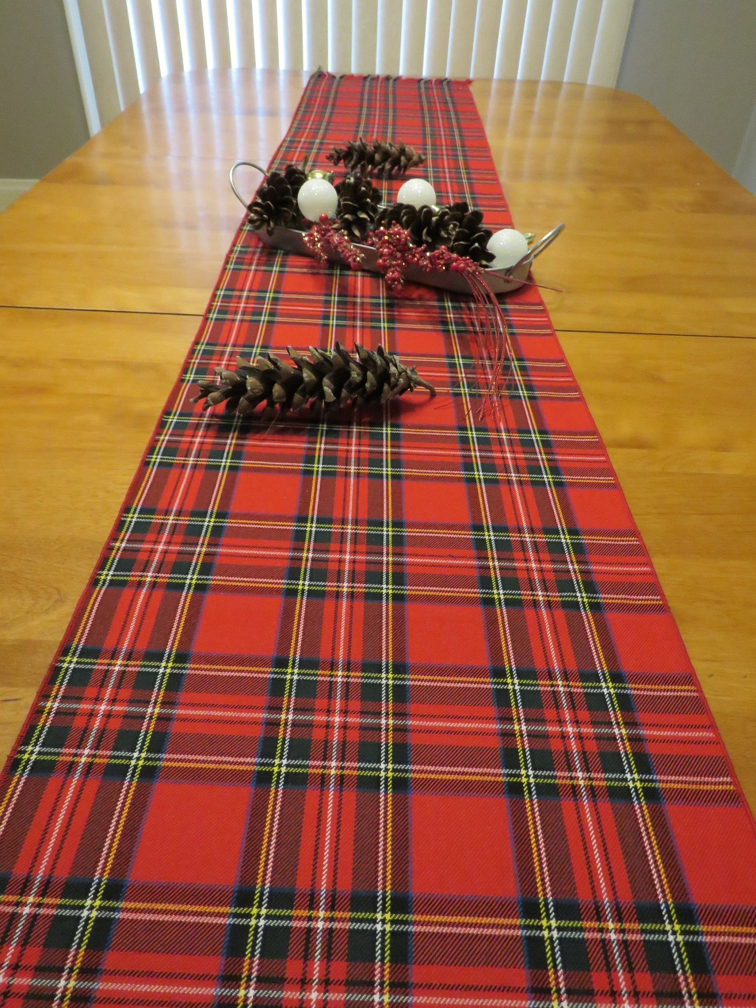 https://www.taylorstartans.com/cdn/shop/products/royal-stewart-tartan-table-runner_1024x1024@2x.jpg?v=1610650539